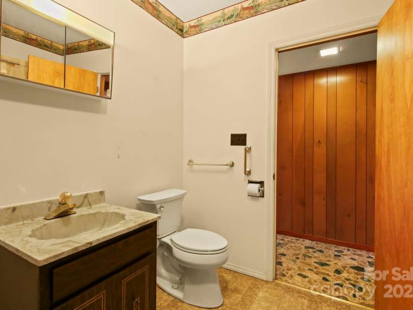 675 Rodgers Road, Newland, NC 28657.  MLS# CAR4247976, YatesRealty ID 7278. Basement Bathroom