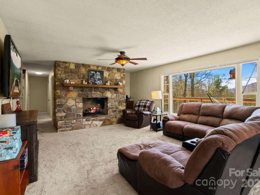 675 Rodgers Road, Newland, NC 28657.  MLS# CAR4247976, YatesRealty ID 7278. Living Room with Fireplace