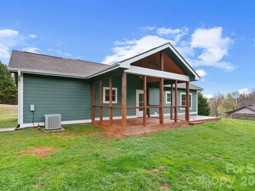 209 Breton Ridge Road, Leicester, NC 28748.  MLS# CAR4355634, YatesRealty ID 7279. Back of house