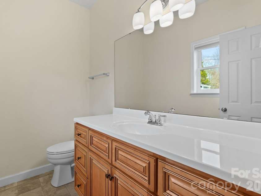 209 Breton Ridge Road, Leicester, NC 28748.  MLS# CAR4355634, YatesRealty ID 7279. Hall Bathroom