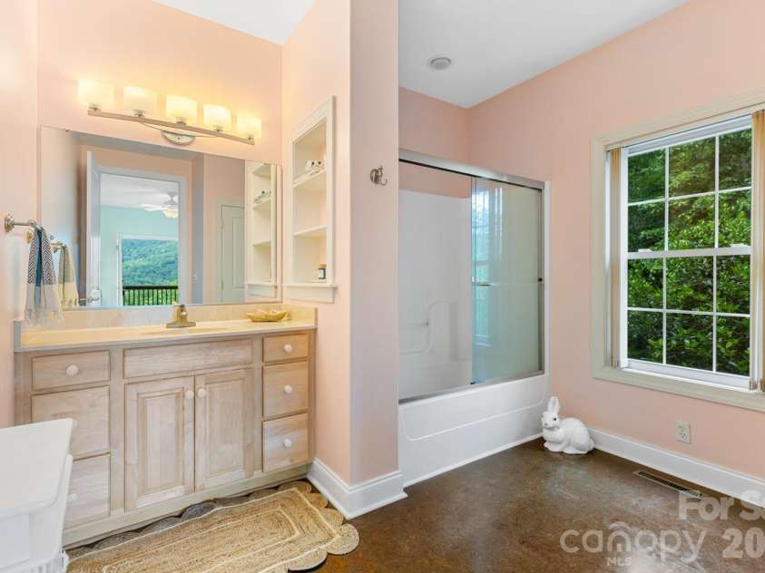 6 Grouse Terrace, Fairview, NC 28730.  MLS# CAR4355853, YatesRealty ID 7286. Ensuite bathroom BR 2