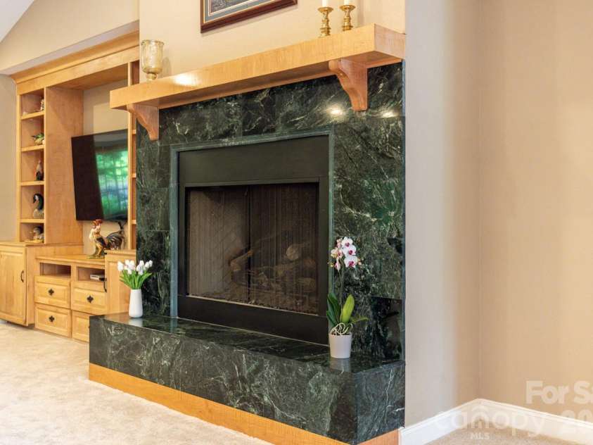 6 Grouse Terrace, Fairview, NC 28730.  MLS# CAR4355853, YatesRealty ID 7286. Huge fireplace with stunning marble surround