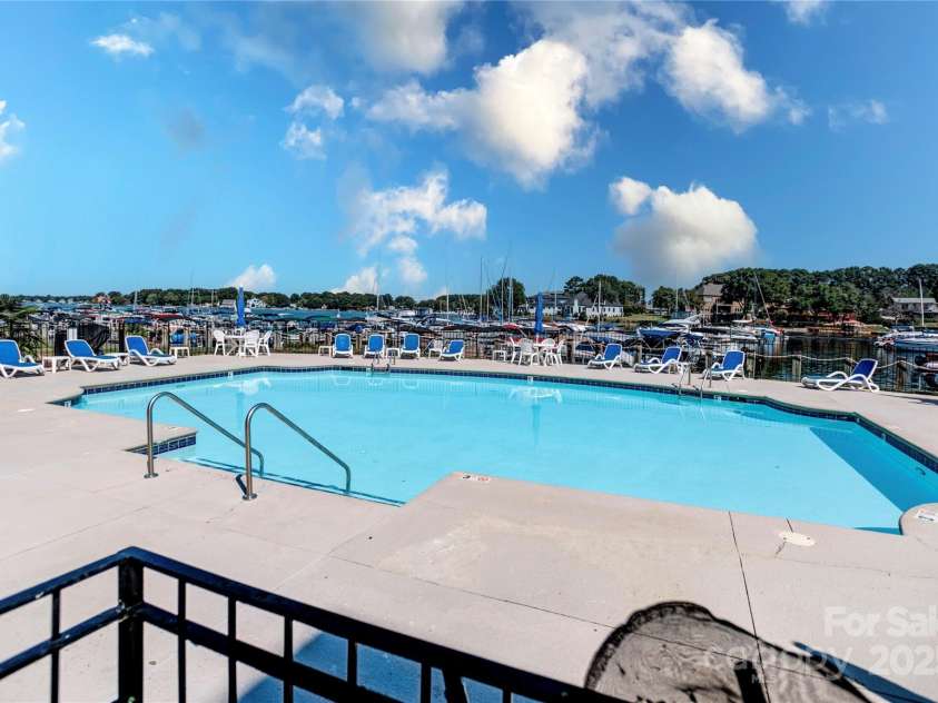 18673 Vineyard Point Lane, Cornelius, NC 28031.  MLS# CAR4304658, YatesRealty ID 729. ...a dip in the pool...