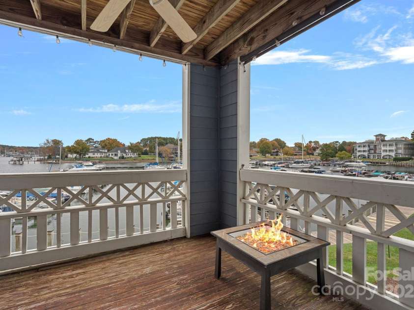 18673 Vineyard Point Lane, Cornelius, NC 28031.  MLS# CAR4304658, YatesRealty ID 729. Your waterfront views and boardwalk strolls await!