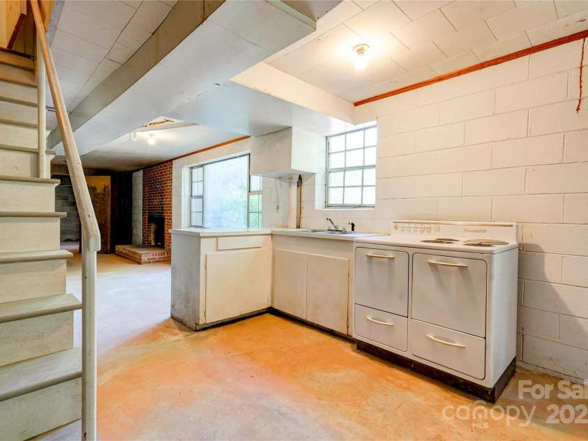 1330 College Avenue, Shelby, NC 28152.  MLS# CAR4227092, YatesRealty ID 7291. Basement Kitchen & Family Room