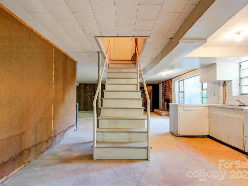 1330 College Avenue, Shelby, NC 28152.  MLS# CAR4227092, YatesRealty ID 7291. Basement Kitchen & Family Room