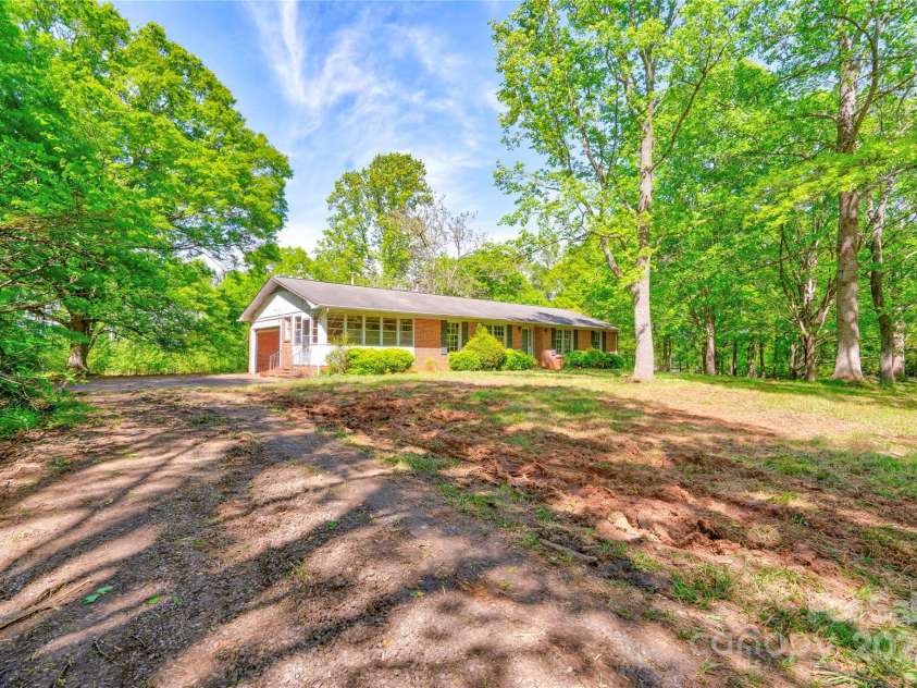 1330 College Avenue, Shelby, NC 28152.  MLS# CAR4227092, YatesRealty ID 7291. Front & Left Side