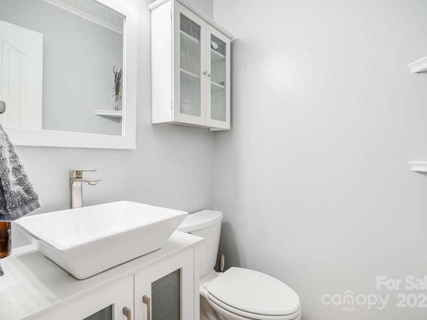 344 Shady Lane, Marion, NC 28752.  MLS# CAR4244222, YatesRealty ID 7292. Primary suite half bathroom