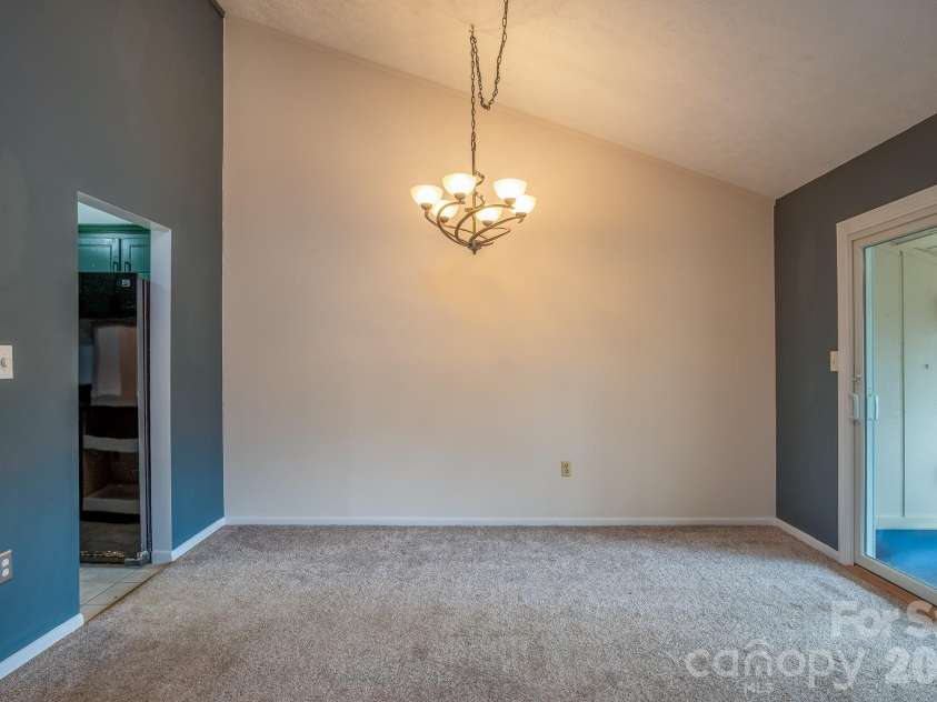1813 Glen Cannon Drive, Pisgah Forest, NC 28768.  MLS# CAR4352130, YatesRealty ID 7298. Dining area with unique lighting