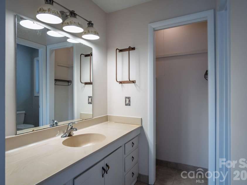 1813 Glen Cannon Drive, Pisgah Forest, NC 28768.  MLS# CAR4352130, YatesRealty ID 7298. Primary bathroom