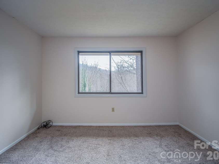 1813 Glen Cannon Drive, Pisgah Forest, NC 28768.  MLS# CAR4352130, YatesRealty ID 7298. Second bedroom