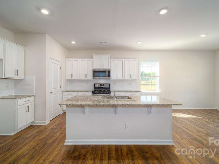 7712 Woolsey Drive, Gastonia, NC 28056.  MLS# CAR4250107, YatesRealty ID 7301. Photos Are Representative