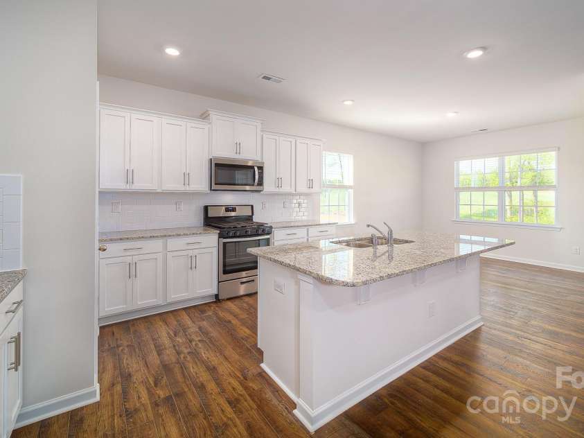 7712 Woolsey Drive, Gastonia, NC 28056.  MLS# CAR4250107, YatesRealty ID 7301. Photos Are Representative
