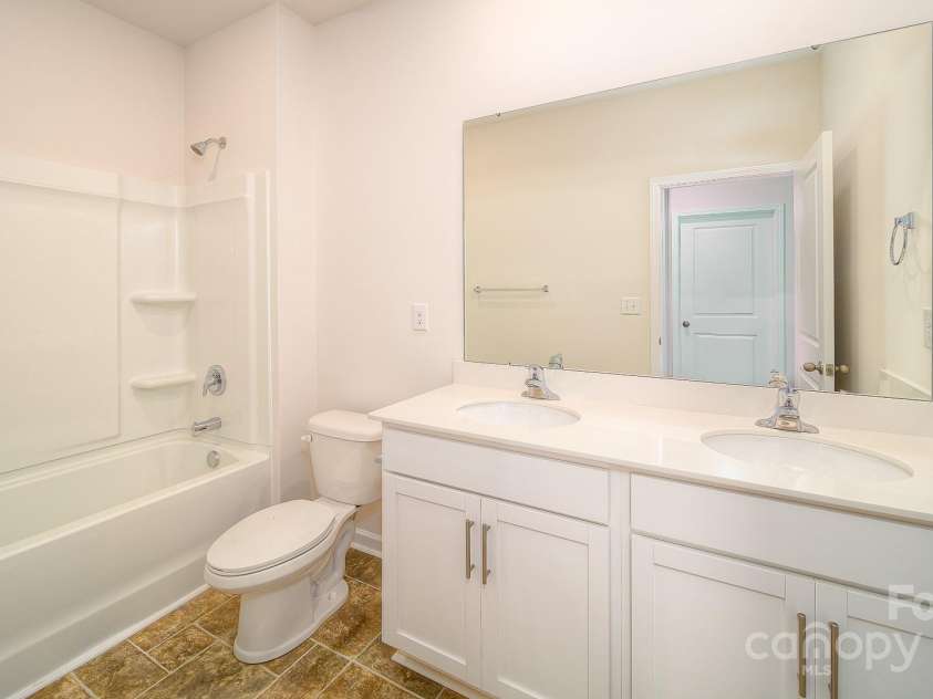 7712 Woolsey Drive, Gastonia, NC 28056.  MLS# CAR4250107, YatesRealty ID 7301. Photos Are Representative