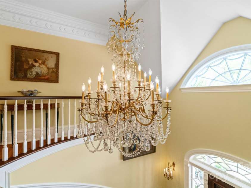229 Joseph Kershaw Road, Eastover, SC 29044.  MLS# CAR4122309, YatesRealty ID 7302. Imported French Chandelier on a Lift is one of 47 curated antique chandeliers and light fixtures throughout the home