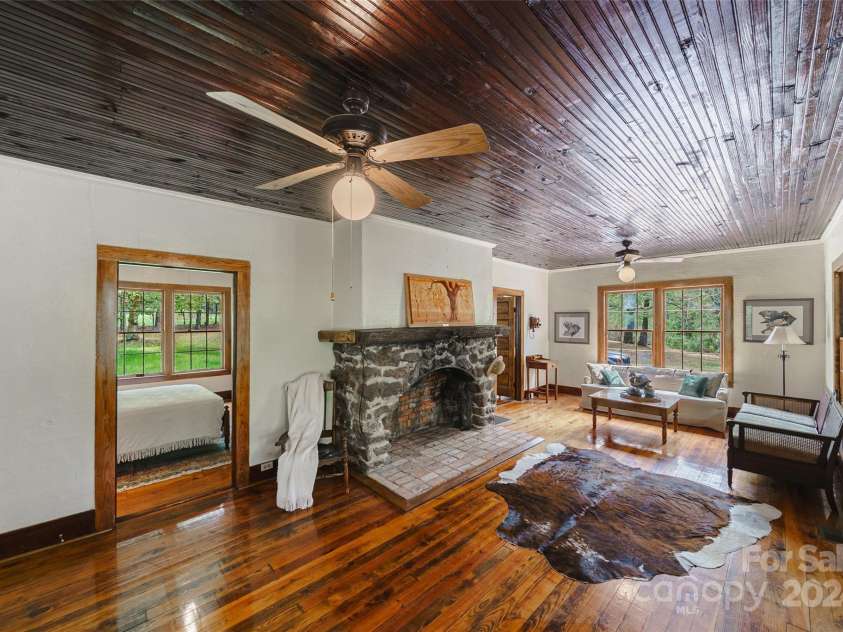 229 Joseph Kershaw Road, Eastover, SC 29044.  MLS# CAR4122309, YatesRealty ID 7302. Lodge Great Room w/large wood burning stone fireplace