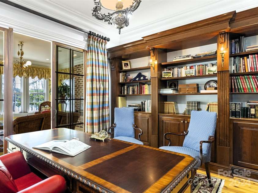 229 Joseph Kershaw Road, Eastover, SC 29044.  MLS# CAR4122309, YatesRealty ID 7302. Office w/custom cabinetry, private half bath and access to the sunroom