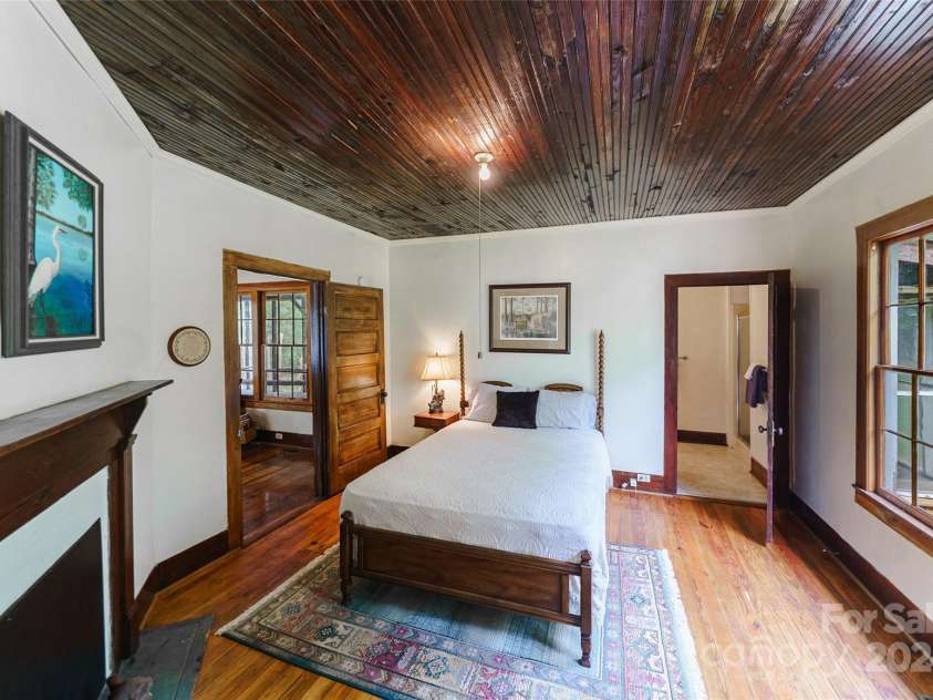 229 Joseph Kershaw Road, Eastover, SC 29044.  MLS# CAR4122309, YatesRealty ID 7302. One of 4 Bedrooms in Lodge, 3 fireplaces and one woodstove, several porches