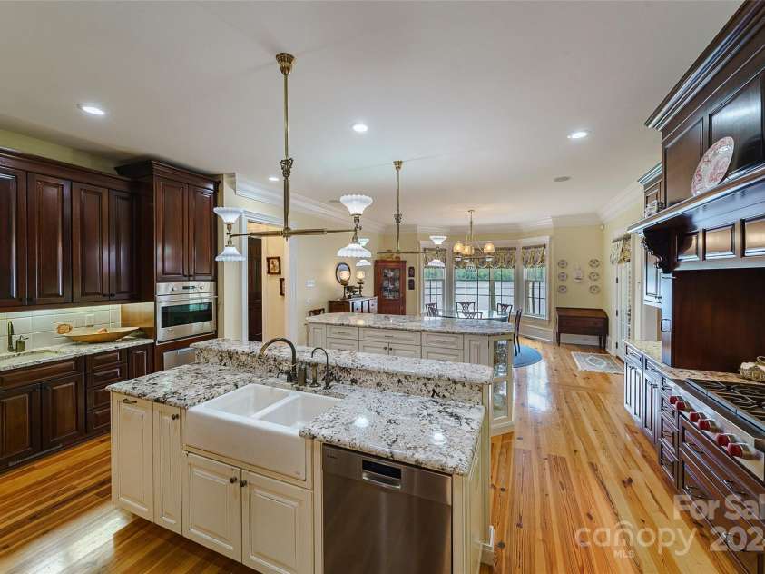 229 Joseph Kershaw Road, Eastover, SC 29044.  MLS# CAR4122309, YatesRealty ID 7302. Primary Home Chef's Kitchen, includes a baking station and cooking station with all upgraded appliances including 3 ovens and 2 dishwashers