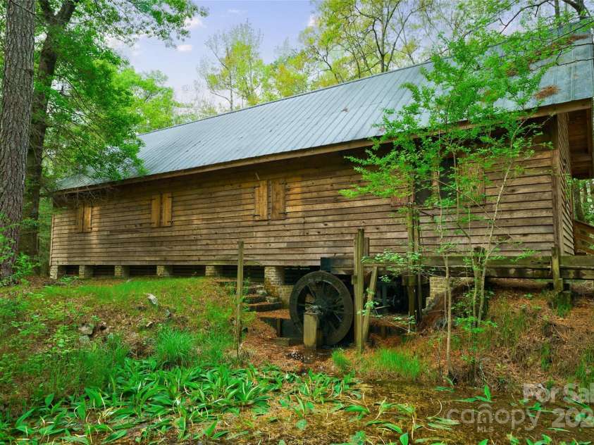 229 Joseph Kershaw Road, Eastover, SC 29044.  MLS# CAR4122309, YatesRealty ID 7302. Several historic structures on the property have been lovingly restored. The Mill House was rebuilt duplicating the original destroyed by Hugo