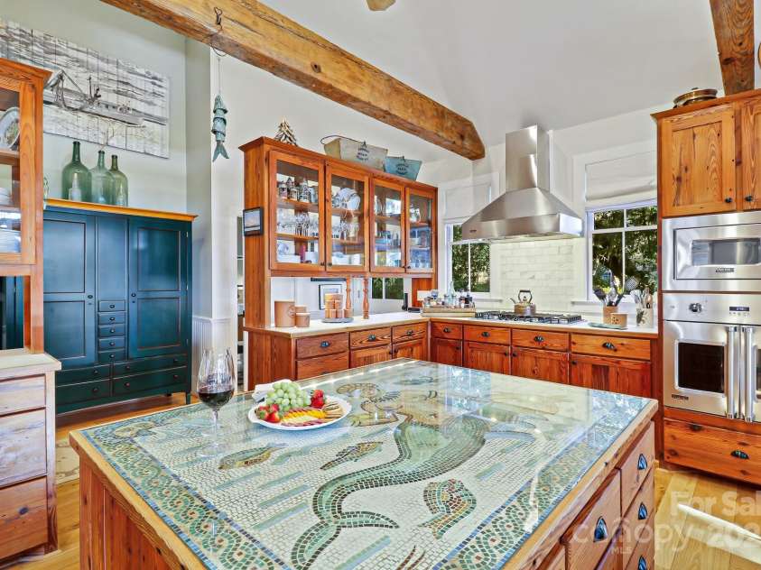 131 Pritchard Street, Bluffton, SC 29910.  MLS# CAR4214365, YatesRealty ID 7303. Entertaining kitchen, dining and sitting room with local artist island countertop