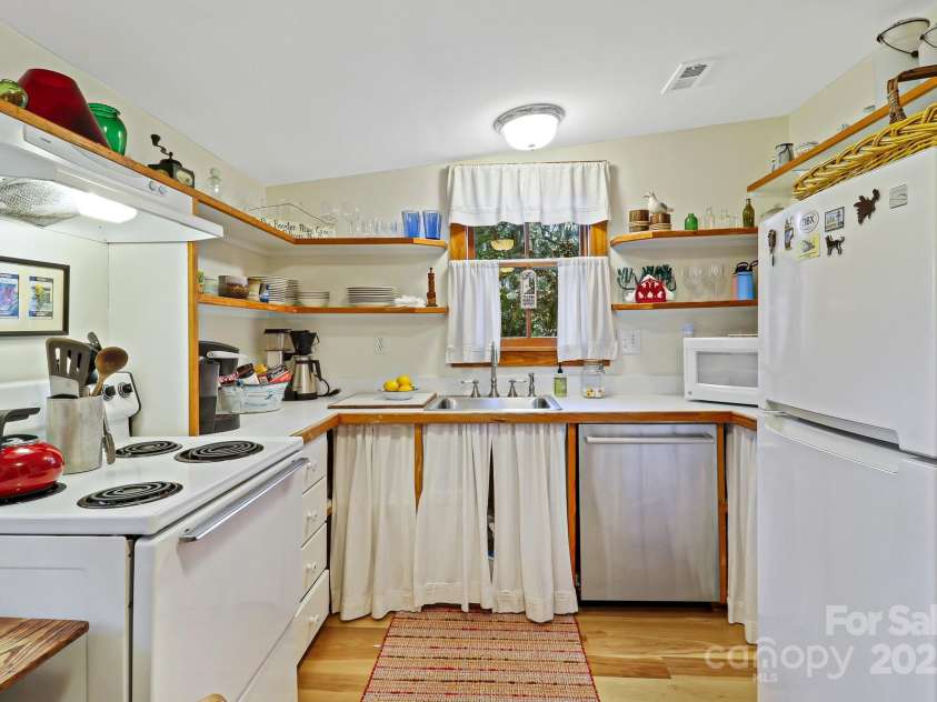 131 Pritchard Street, Bluffton, SC 29910.  MLS# CAR4214365, YatesRealty ID 7303. Fully supplied kitchen, with new bosch DW, refrigerator, stove & MW