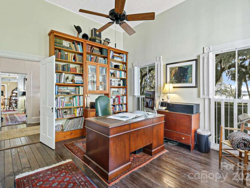 131 Pritchard Street, Bluffton, SC 29910.  MLS# CAR4214365, YatesRealty ID 7303. Office/Flex room with heart of pine cabinetry and 7' breezeway windows