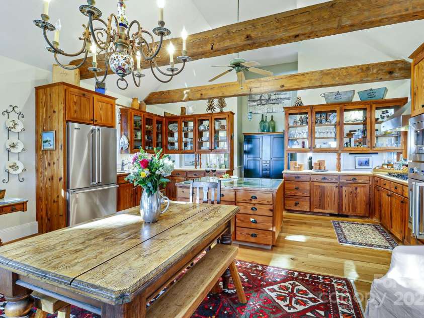 131 Pritchard Street, Bluffton, SC 29910.  MLS# CAR4214365, YatesRealty ID 7303. Reclaimed wood beams, wall of glass cabinets