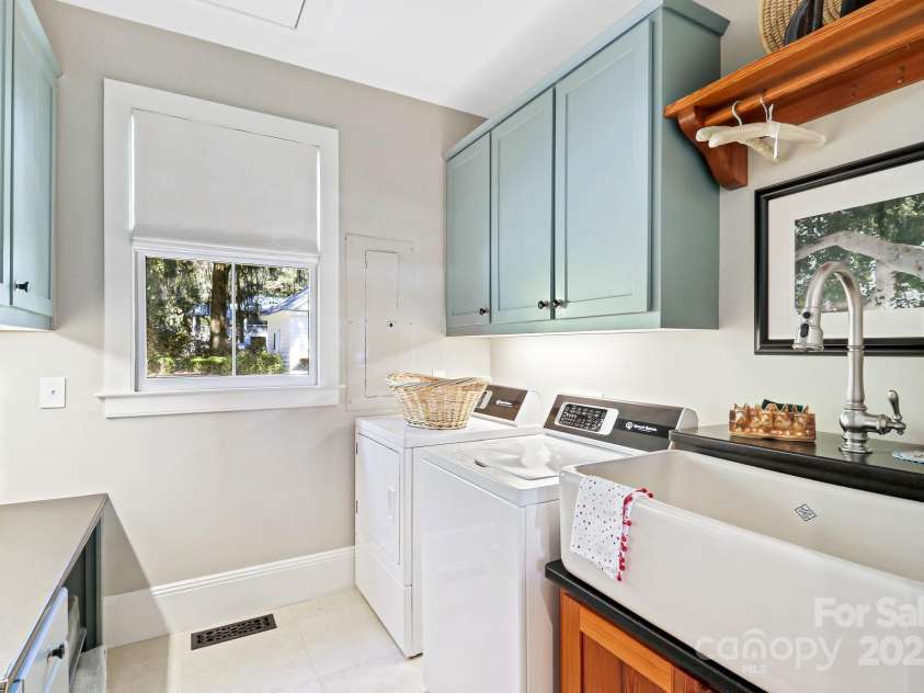 131 Pritchard Street, Bluffton, SC 29910.  MLS# CAR4214365, YatesRealty ID 7303. Updated laundry room with honed granite counters, shaw farmhouse sink and computer niche