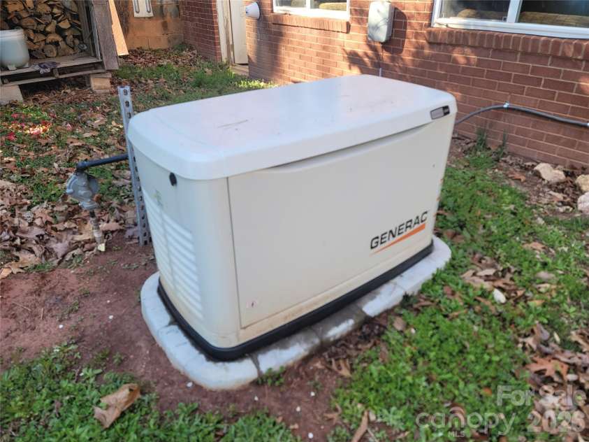 1090 Harris Bridge Road, Stony Point, NC 28678.  MLS# CAR4359624, YatesRealty ID 7305. New Generac Generator
