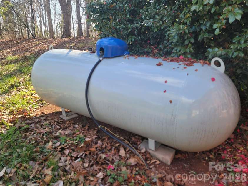 1090 Harris Bridge Road, Stony Point, NC 28678.  MLS# CAR4359624, YatesRealty ID 7305. New Propane tank