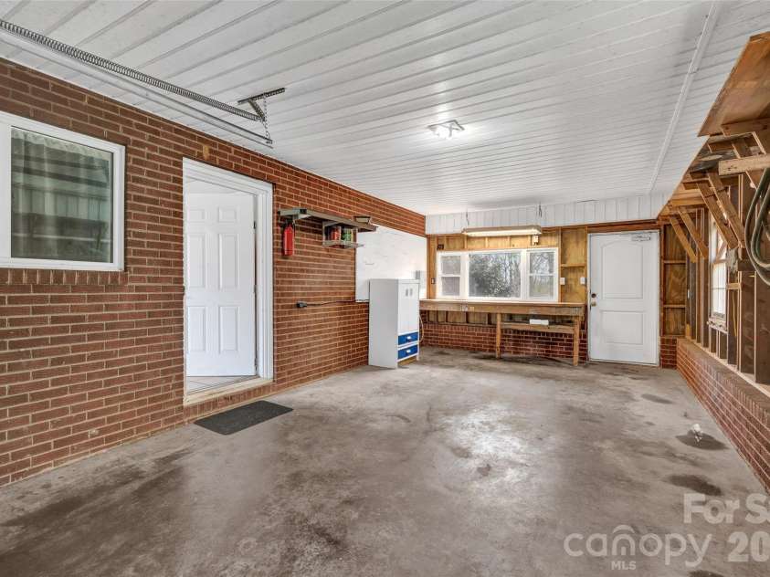 1090 Harris Bridge Road, Stony Point, NC 28678.  MLS# CAR4359624, YatesRealty ID 7305. Single Garage