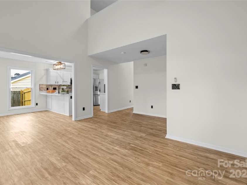 10211 Ridgewell Court, Charlotte, NC 28215.  MLS# CAR4227517, YatesRealty ID 7313. Another view of Great Room looking into the Kitchen