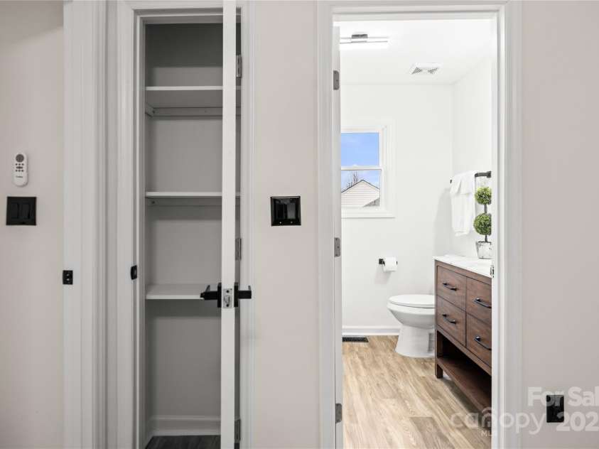 10211 Ridgewell Court, Charlotte, NC 28215.  MLS# CAR4227517, YatesRealty ID 7313. View looking into the secondary bathroom