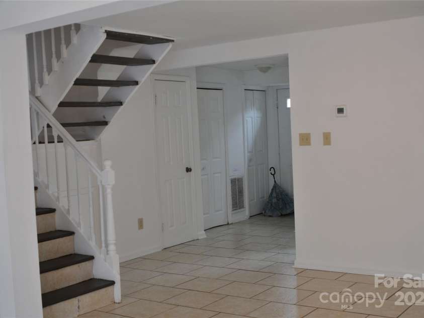 9626-C Vinca Circle, Charlotte, NC 28213.  MLS# CAR4290959, YatesRealty ID 7313. View from den to front door