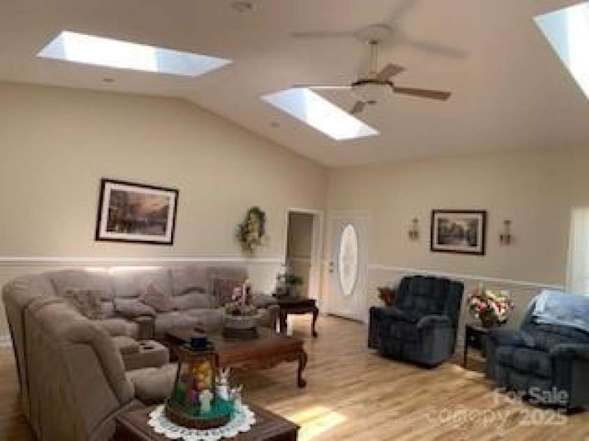 2399 PLEASANT GROVE Road, Hendersonville, NC 28739.  MLS# CAR4247893, YatesRealty ID 7314. Large Back Den,skylight, private Bath