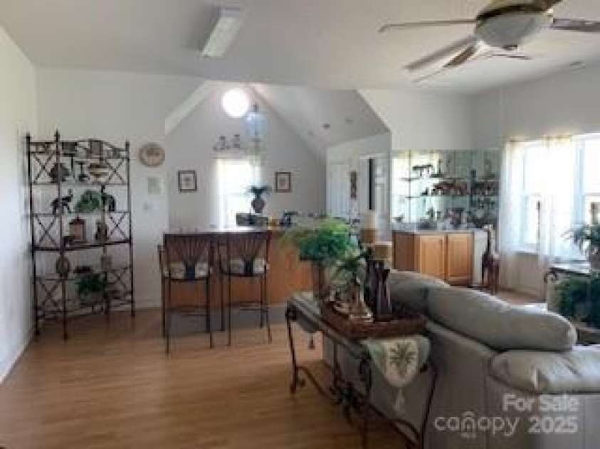 2399 PLEASANT GROVE Road, Hendersonville, NC 28739.  MLS# CAR4247893, YatesRealty ID 7314. UPPER: PLAY ROOM, area for Pool Table, Pull Down Movie Screen, FULL KITCHEN, RELAXING AREA, STK W&D, ETC.