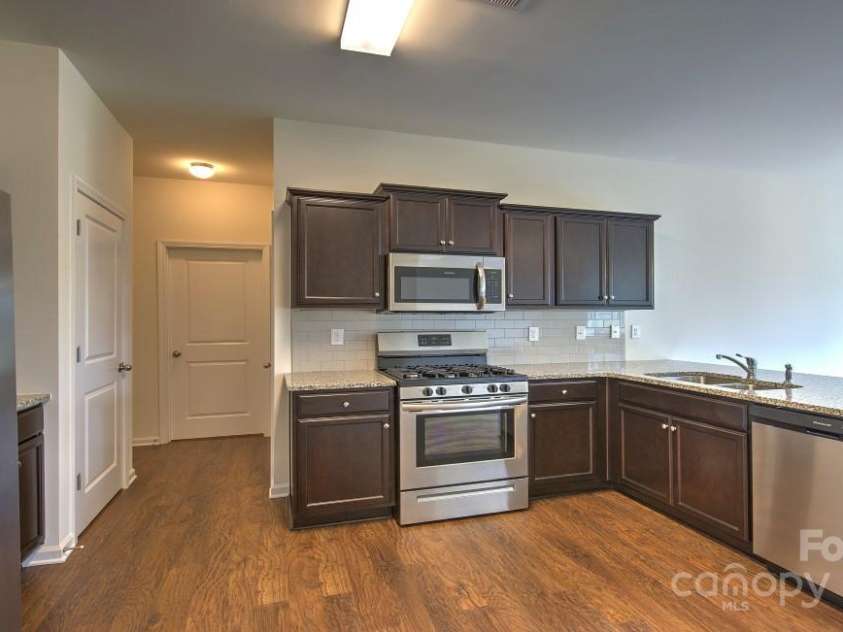 134 Shorthorn Road, Fletcher, NC 28732.  MLS# CAR4198932, YatesRealty ID 7317. Photo is from a model home of the same floor plan - some details/options may be different