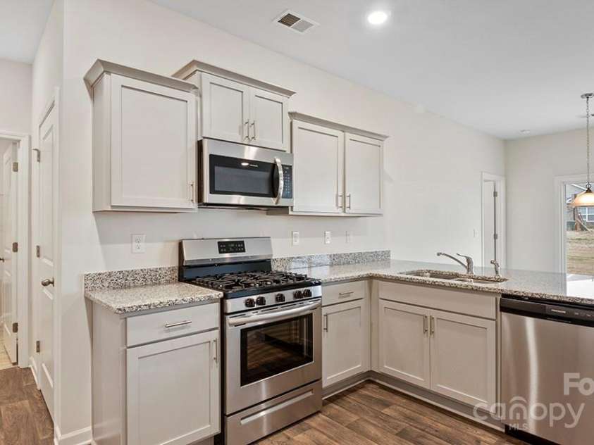 134 Shorthorn Road, Fletcher, NC 28732.  MLS# CAR4198932, YatesRealty ID 7317. Photo is from a model home of the same floor plan - some details/options may be different