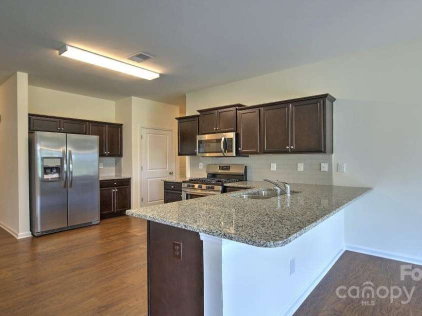 134 Shorthorn Road, Fletcher, NC 28732.  MLS# CAR4198932, YatesRealty ID 7317. Photo is from a model home of the same floor plan - some details/options may be different
