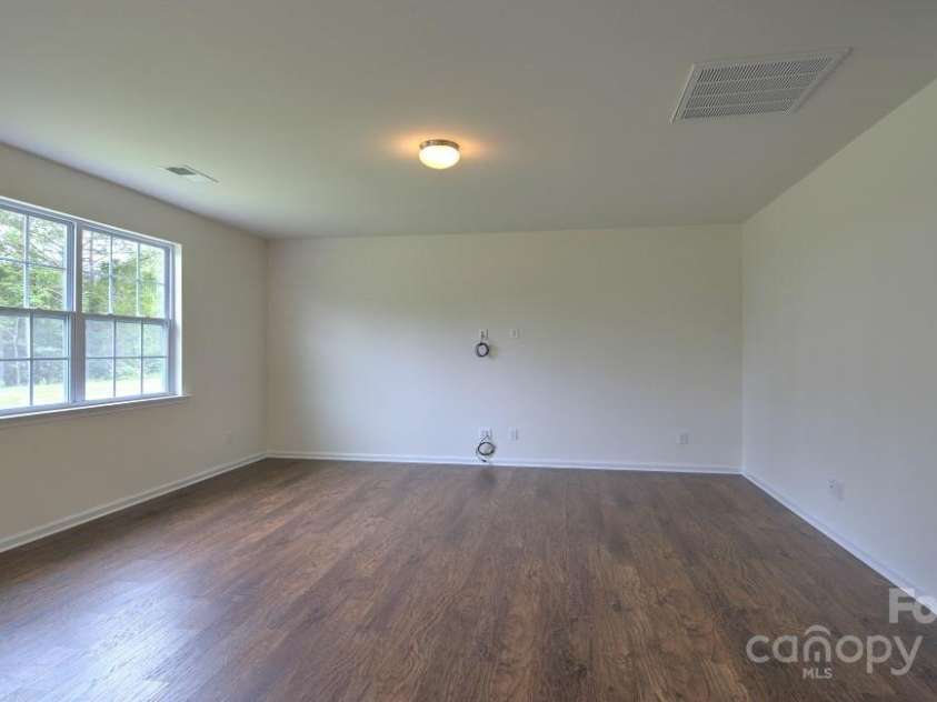 134 Shorthorn Road, Fletcher, NC 28732.  MLS# CAR4198932, YatesRealty ID 7317. Photo is from a model home of the same floor plan - some details/options may be different