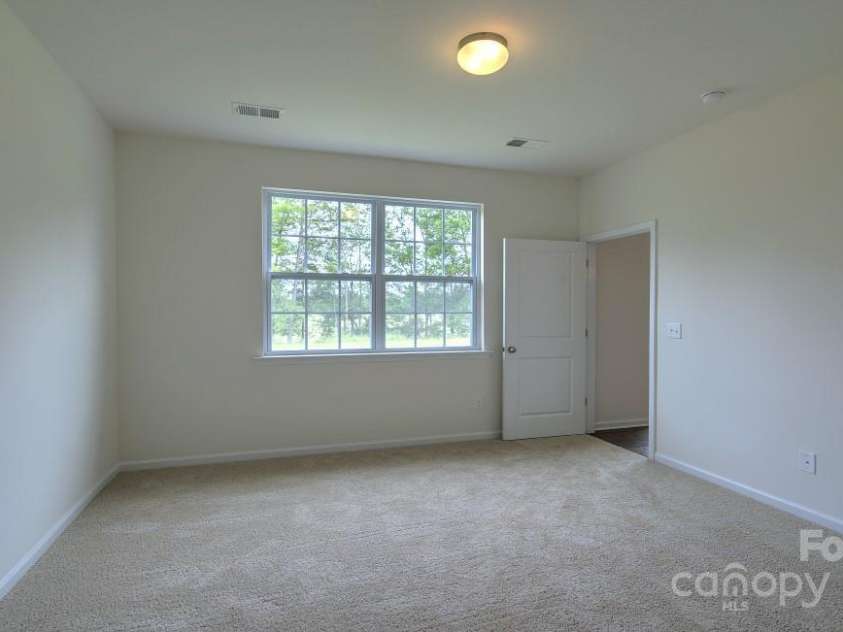 134 Shorthorn Road, Fletcher, NC 28732.  MLS# CAR4198932, YatesRealty ID 7317. Photo is from a model home of the same floor plan - some details/options may be different