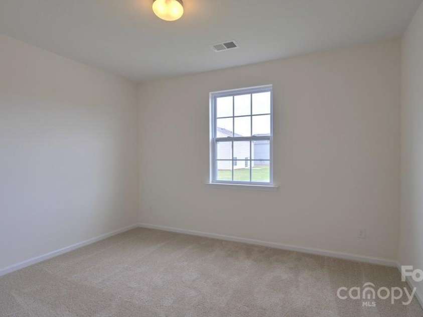 134 Shorthorn Road, Fletcher, NC 28732.  MLS# CAR4198932, YatesRealty ID 7317. Photo is from a model home of the same floor plan - some details/options may be different