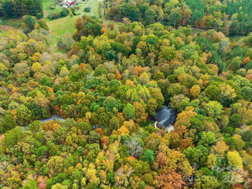 11113 Asbury Chapel Road, Huntersville, NC 28078.  MLS# CAR4317165, YatesRealty ID 733. Nestled in 5.3 Acres