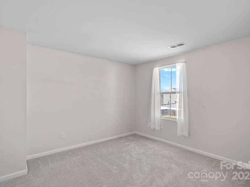 2462 Willow Pond Lane, Concord, NC 28025.  MLS# CAR4228242, YatesRealty ID 7334. Back Secondary Bedroom