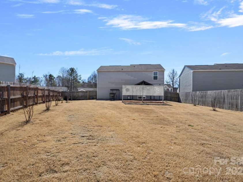 2462 Willow Pond Lane, Concord, NC 28025.  MLS# CAR4228242, YatesRealty ID 7334. Fenced backyard