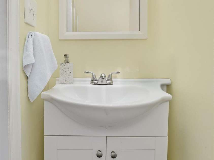 106 Blacksnake Road, Stanley, NC 28164.  MLS# CAR4351703, YatesRealty ID 7335. Half bath in master bedroom.