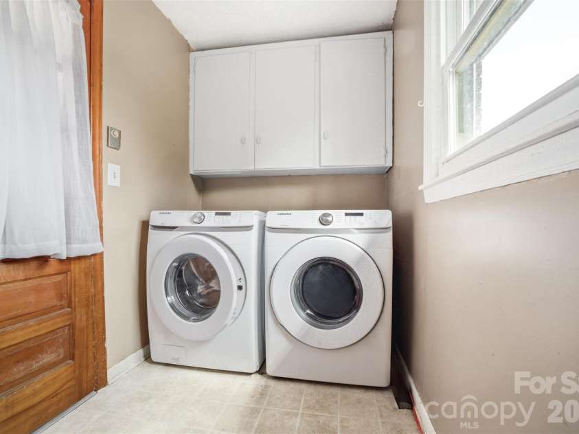 106 Blacksnake Road, Stanley, NC 28164.  MLS# CAR4351703, YatesRealty ID 7335. Laundry room in carport. 