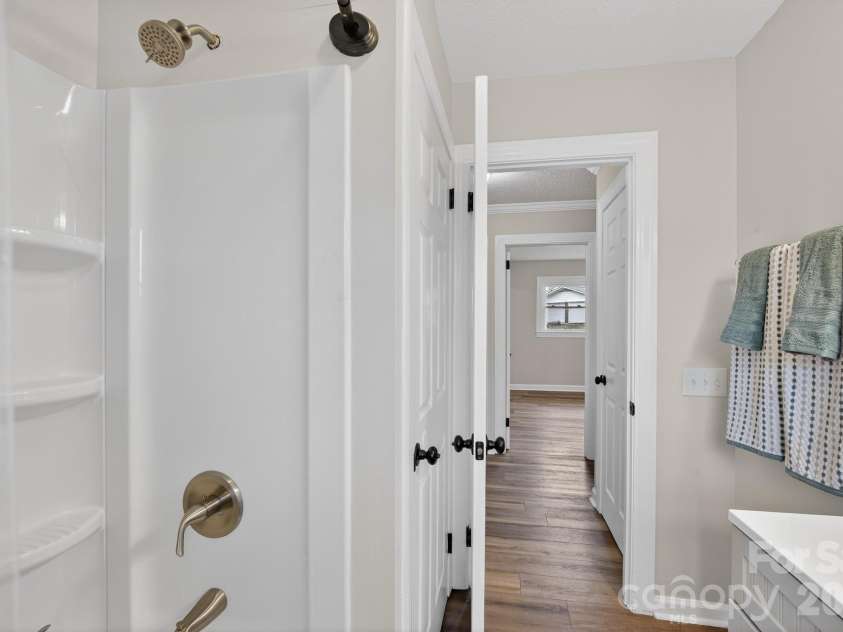 1037 Prestwood Drive, Lenoir, NC 28645.  MLS# CAR4351995, YatesRealty ID 7339. Hall bathroom