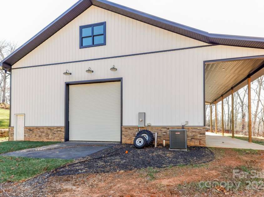 640 Laurel Heights Lane, Tryon, NC 28782.  MLS# CAR4212228, YatesRealty ID 7354. Back of Building